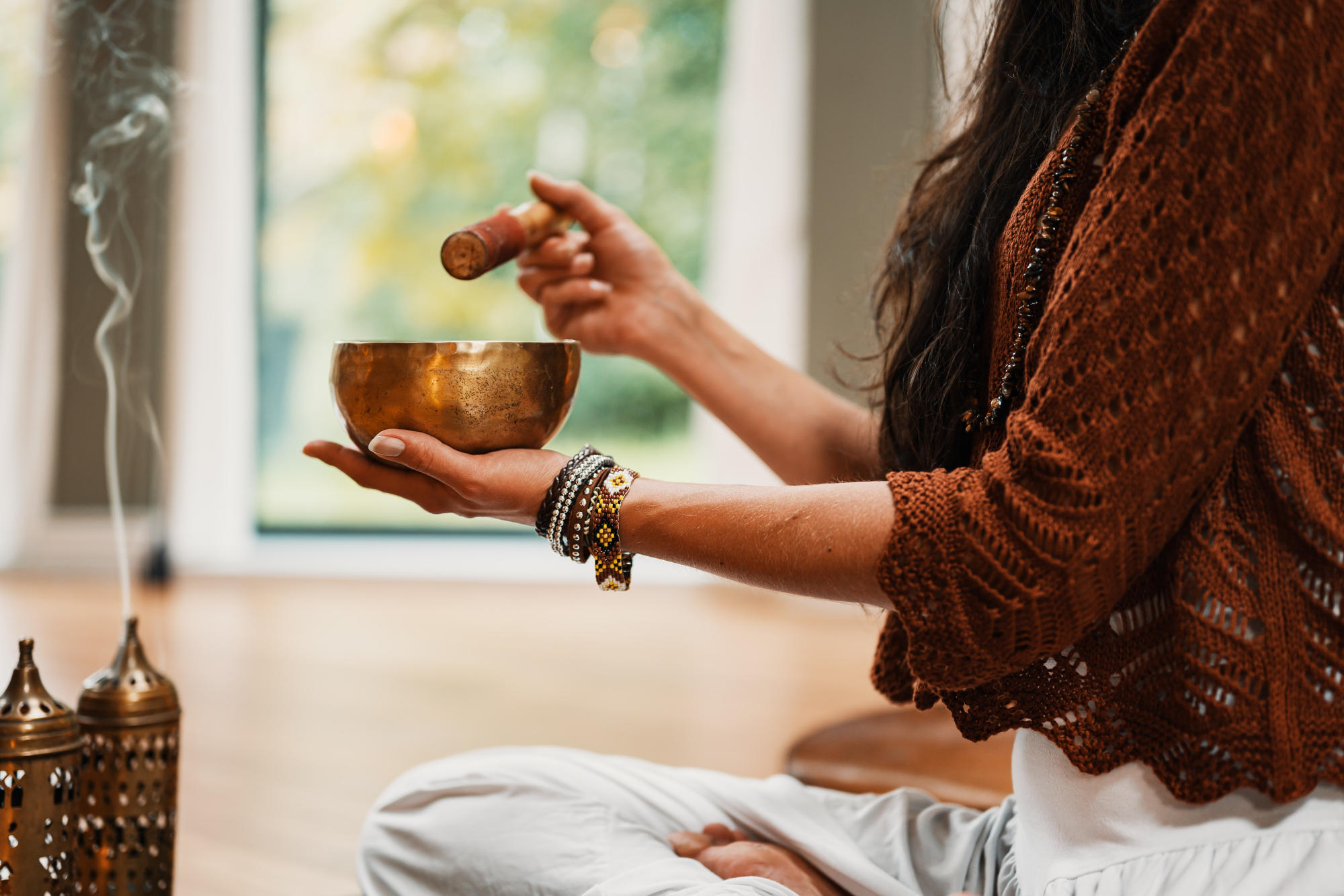 Woman with meditating bowl